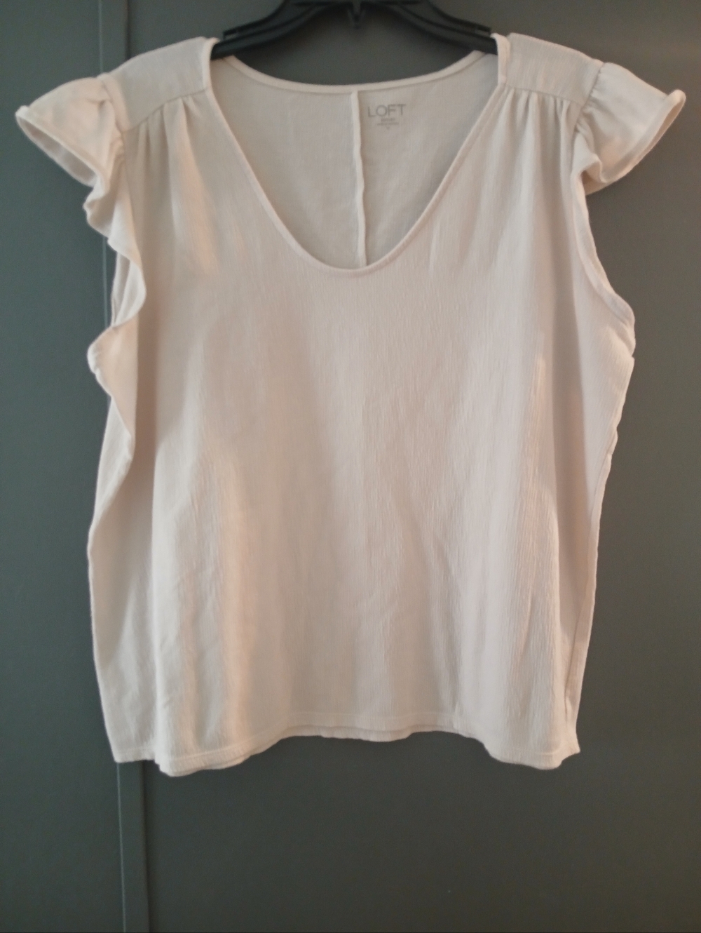 Loft brand women's short ruffle sleeve top in a cream color M